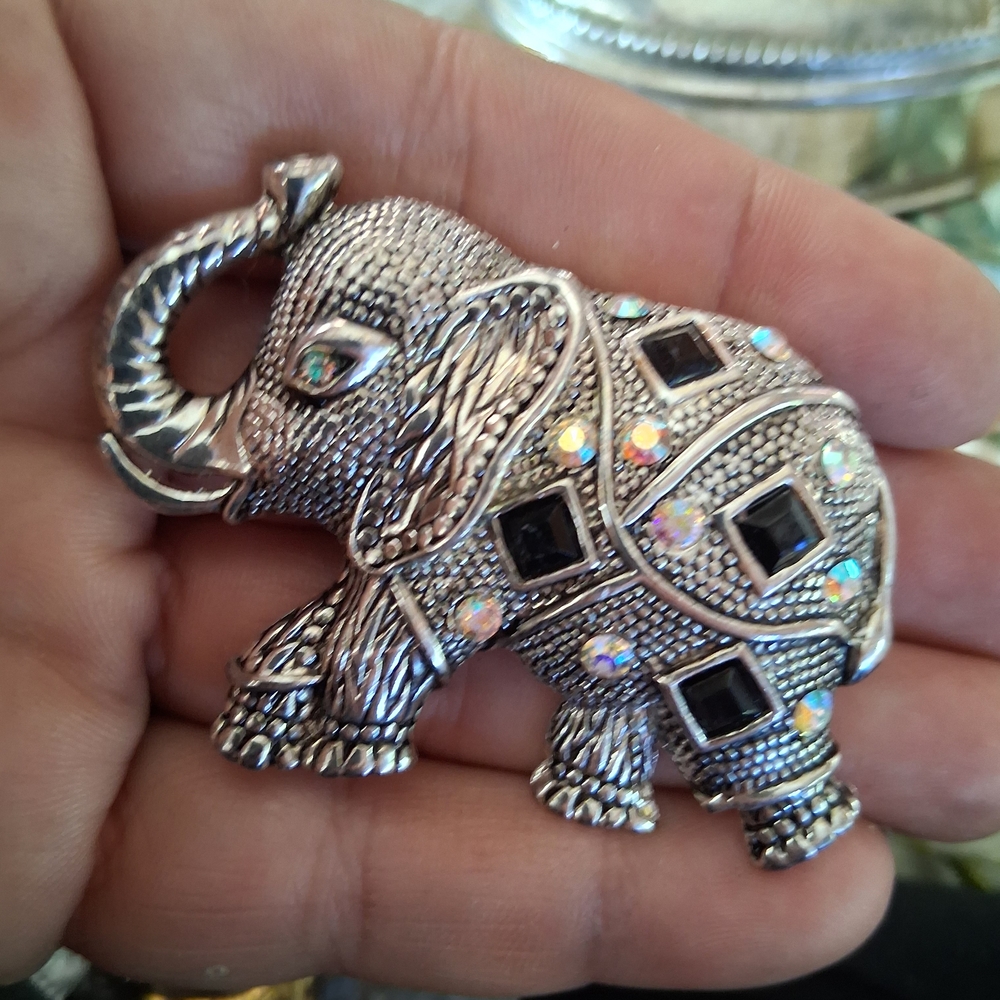 Ornate Silver Elephant Brooch with Black and Iridescent Accents